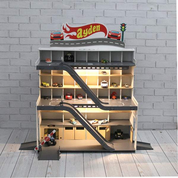 Toy car garage with a toy car wash, doors, gates and mutiple ramps in white