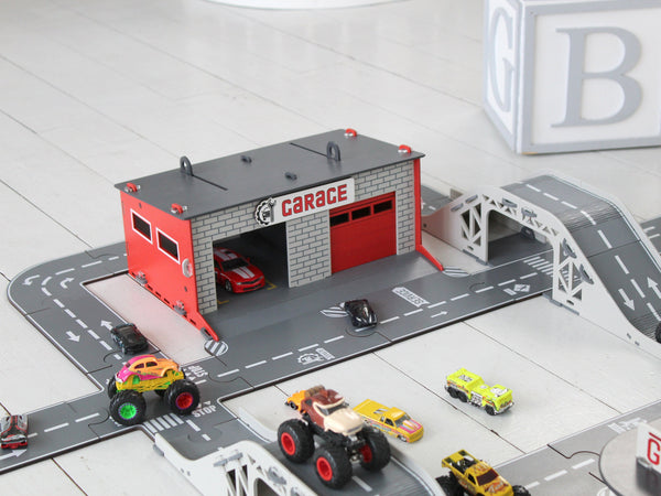 Puzze Roads for Toy Cars with Toy Garages and Toy Bridges